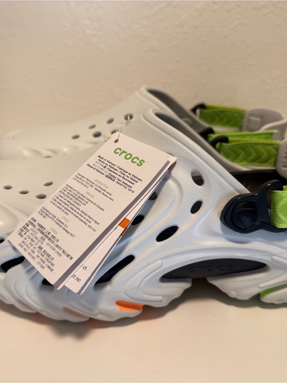 CROCS White Clog Sandals with Green and Orange Accents